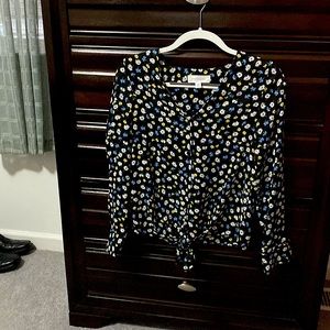 Cute long sleeve floral (white, blue, and yellow) on a black background top